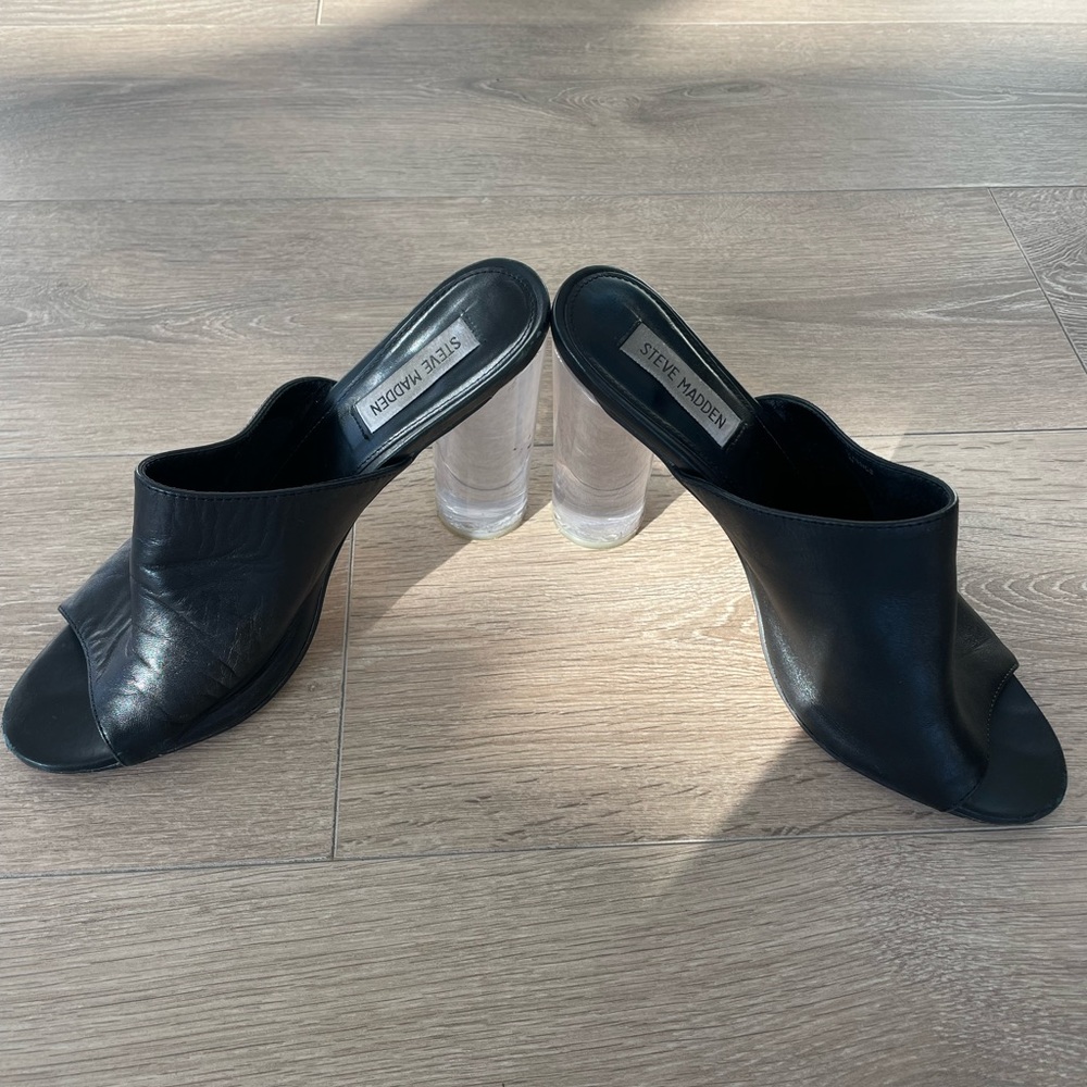 Steve Madden clear heel slip on sandals.
